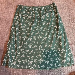 Princess Polly green mini floral skirt